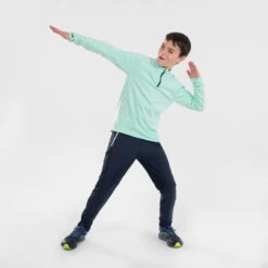 KIDS WARM RUNNING TROUSERS - KIPRUN WARM ZIP -Sports Shop k094c02bd67c4c8d3ab78d27e3e8200c2