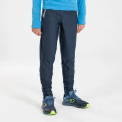 KIDS WARM RUNNING TROUSERS - KIPRUN WARM ZIP -Sports Shop kcbafd2823fc68e254038c4bad266ff89